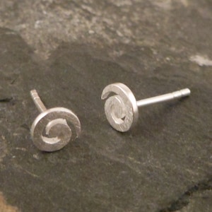 Silver earrings, spiral