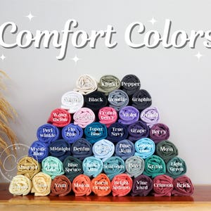a pile of crochet yarn sitting on top of a wooden table