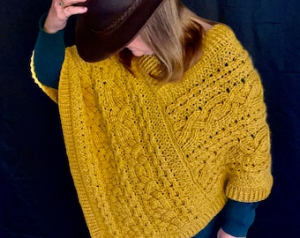 Poncho de cables errantes de Bonnie