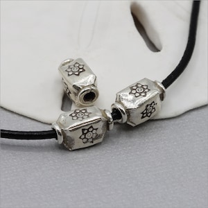 HB139 ~ Hill Tribe Silver Bead, Flower Stamped Tube Bead, 11mm x 6mm, Package of 2