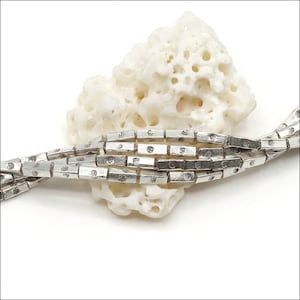 HSTR22 ~ Hill Tribe Silver Bead Strand, Stamped Tube Beads, 5mm x 1.5mm, 13.5 inch strand, Approximately 75 beads, Price per Strand