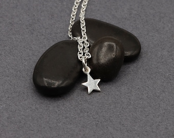 SC12 ~ Sterling Silver Tiny Star Charm ~ Price per piece