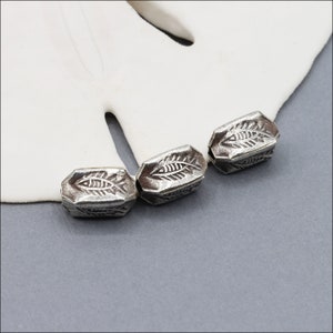 HB130 ~ Hill Tribe Silver Beads, Fish Stamped Bead, 11mm x 5mm, Package of 2