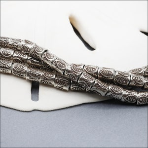 HSTR30 ~ Hill Tribe Silver Bead Strand, Lightweight, Fish Stamped Beads, 4mm x 3mm, 4 inch strand, Approximately 25 beads, Price per Strand