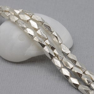 HSTR17 ~ Hill Tribe Silver Bead Strand, Faceted Spacer Beads, 5.7mm x 3mm, 3 inch strand, Approximately 13 beads ~ Price per Strand image 1