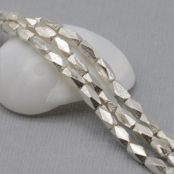 HSTR17 ~ Hill Tribe Silver Bead Strand, Faceted Spacer Beads, 5.7mm x 3mm, 3 inch strand, Approximately 13 beads ~ Price per Strand