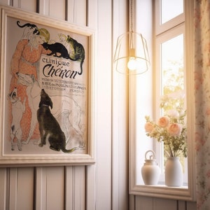 May include: A vintage framed poster advertising a veterinary clinic called "Clinique Ch&eacute;kon" with a woman and several animals, including a dog, cat, and a rabbit. The poster is in a white frame and is hanging on a white wood panel wall.