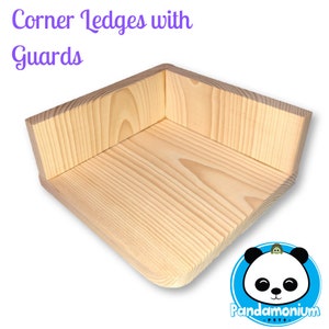 May include: Corner ledge with guards for small pets. The ledge is made of natural wood and has a rounded edge. The ledge is designed to be placed in a corner of a room.