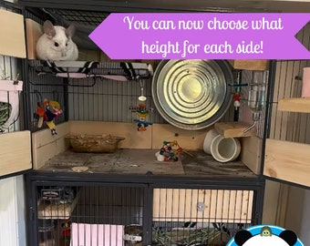 May include: A multi-level cage for small animals, with a white chinchilla on the top level. The cage has a variety of accessories, including a water bottle, a food bowl, and a hammock. The cage is made of black metal and has a wooden base. The text "You can now choose what height for each side!" is written on a purple background.
