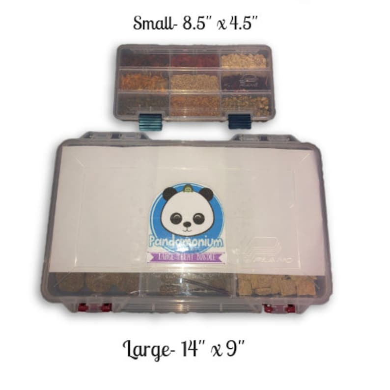 May include: Two clear plastic storage containers with lids. The smaller container is 8.5 inches by 4.5 inches. The larger container is 14 inches by 9 inches. The larger container has a panda logo with the text "Pandamonium Large Treat Bundle".
