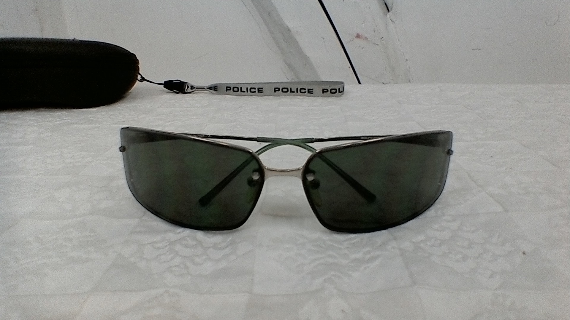 Occhiali da sole shop uomo avvolgenti police
