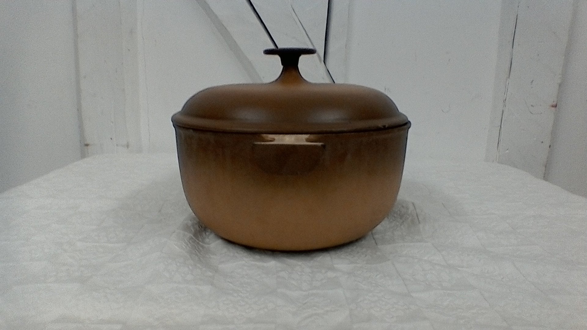Poêlon / casserole / cocotte en Fonte Le Creuset orange