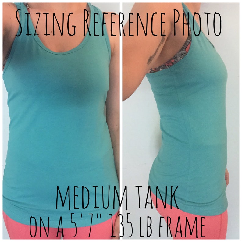 May include: A teal tank top with a scoop neckline and racerback style. The image includes the text SIZING REFERENCE PHOTO, MEDIUM TANK ON A 5' 7" 135 LB FRAME. The garment is shown from the front and side views, paired with coral-colored bottoms.