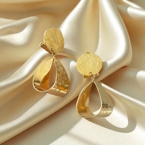 Gold-plated dangling clip-on earrings