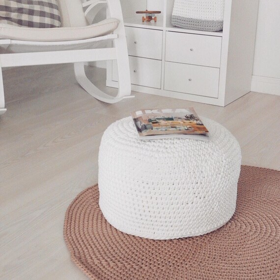 white floor cushion