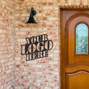 a wooden door with a sign that says your logo here