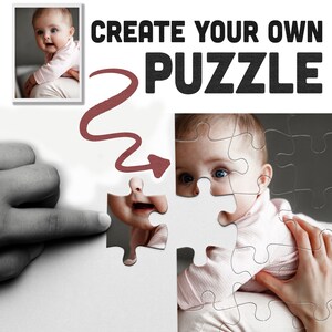 a hand holding a puzzle piece with a picture of a baby