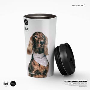 a coffee cup with a picture of a dog on it