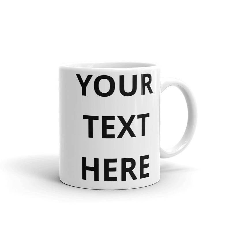 a white coffee mug with the words your text here on it