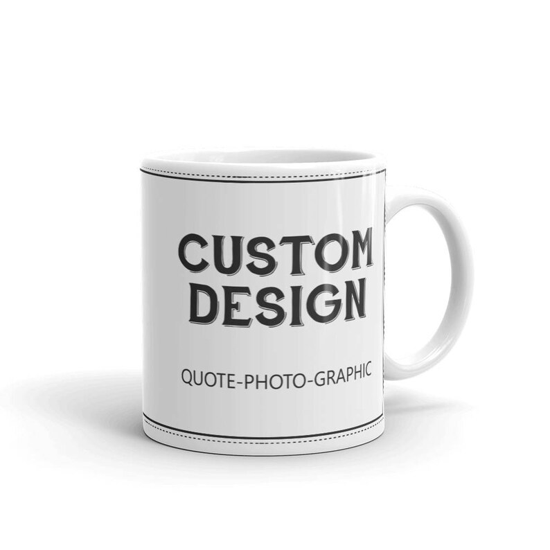 a white coffee mug with the words custom design on it