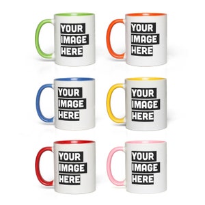 four different colored coffee mugs with your image here on them