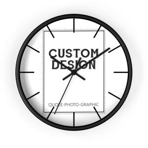 May include: Black and white clock with a white face and black hands. The clock face has a white rectangle with the text "CUSTOM DESIGN QUOTE-PHOTO-GRAPHIC".