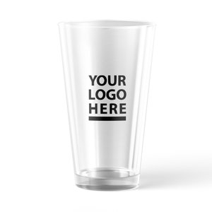 a shot glass with a black and white logo on it