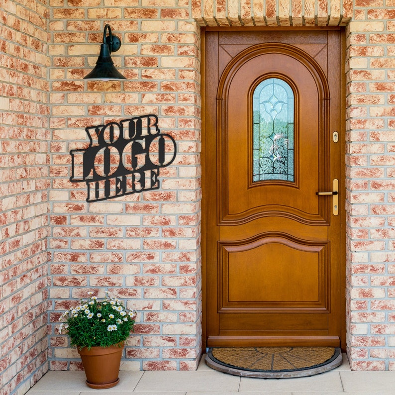 a wooden door with a sign that says your logo here