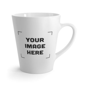 May include: White ceramic latte mug with a black outline and the text "YOUR IMAGE HERE" inside the outline.