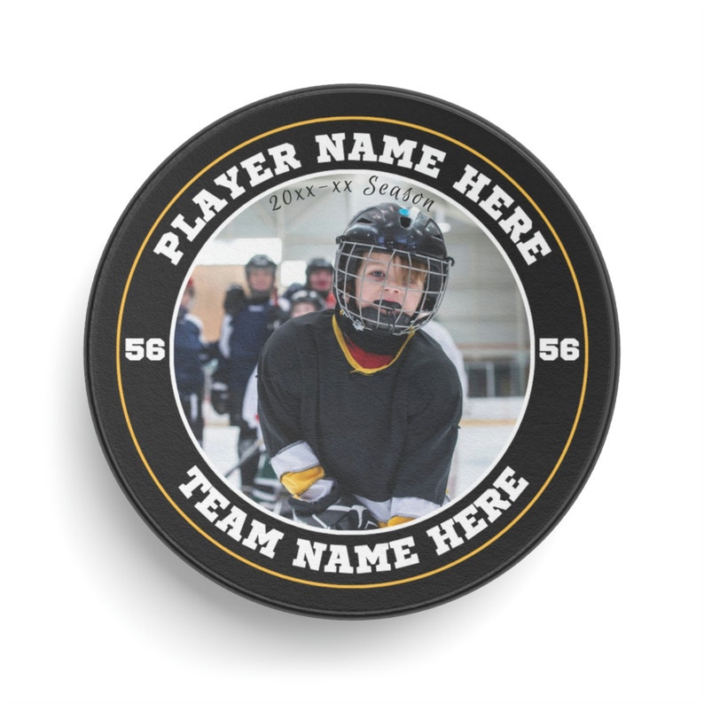 a hockey puck with a picture of a player on it