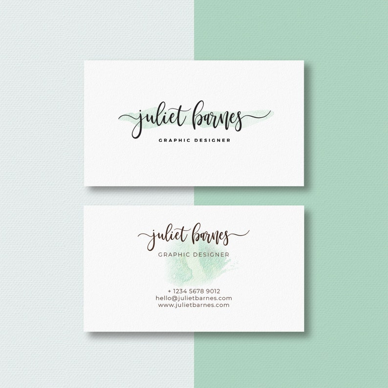 two business cards with a green plant on them