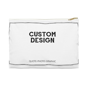 a white cosmetic bag with the words custom design printed on it