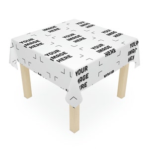 a table that has a white table cloth on it
