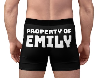 May include: Black boxer briefs with the text "PROPERTY OF EMILY" in large white capital letters across the back. The underwear has a black waistband and is made of a soft material.