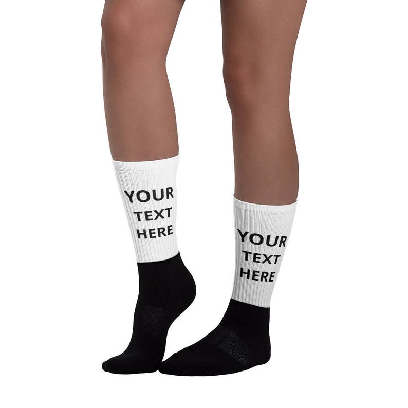 a woman's legs with socks that say your text here