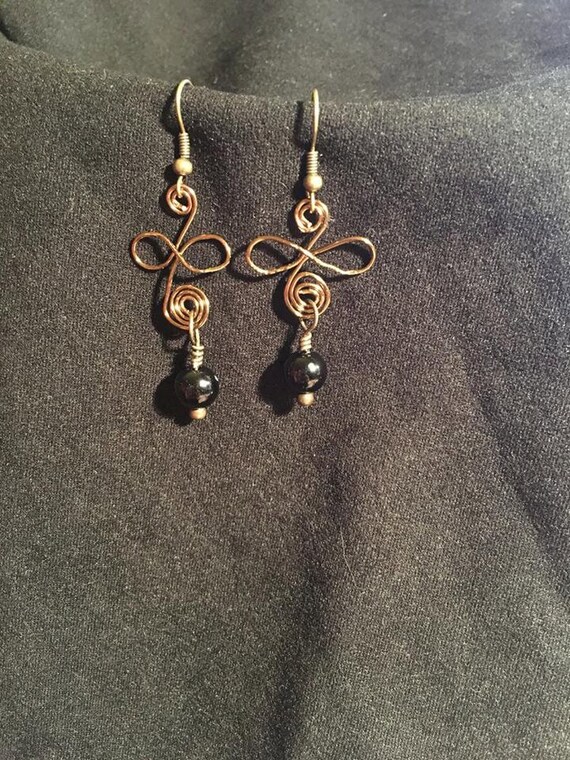 Items similar to Black In Bronze Earrings on Etsy