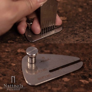 May include: A stainless steel tool with a graduated scale and a small knob. The tool is used to measure the thickness of leather.