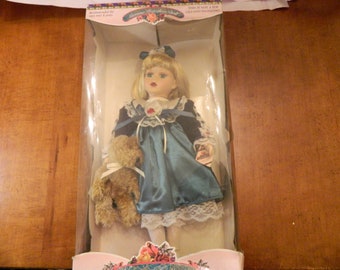 Genuine Porcelain Doll by Melissa Jane. New. Rare.