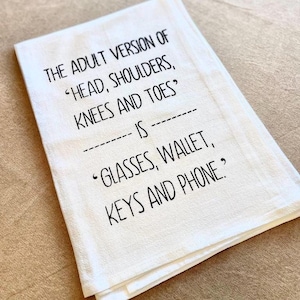 Adult Humor Gift Birthday Present Friend Funny Kitchen Towel Cotton Dish Cloth White Textile Absorbent Material Printed Joke Text Housewarming Hostess Appreciation Novelty Gag Item Sarcastic Comedy Design Perfect Kitchen Essential Unique The Adult Version Of Head, Shoulders, Knees and Toes is Glasses, Wallet, Keys and Phone Kitchen Tea Towel Screen Printed
