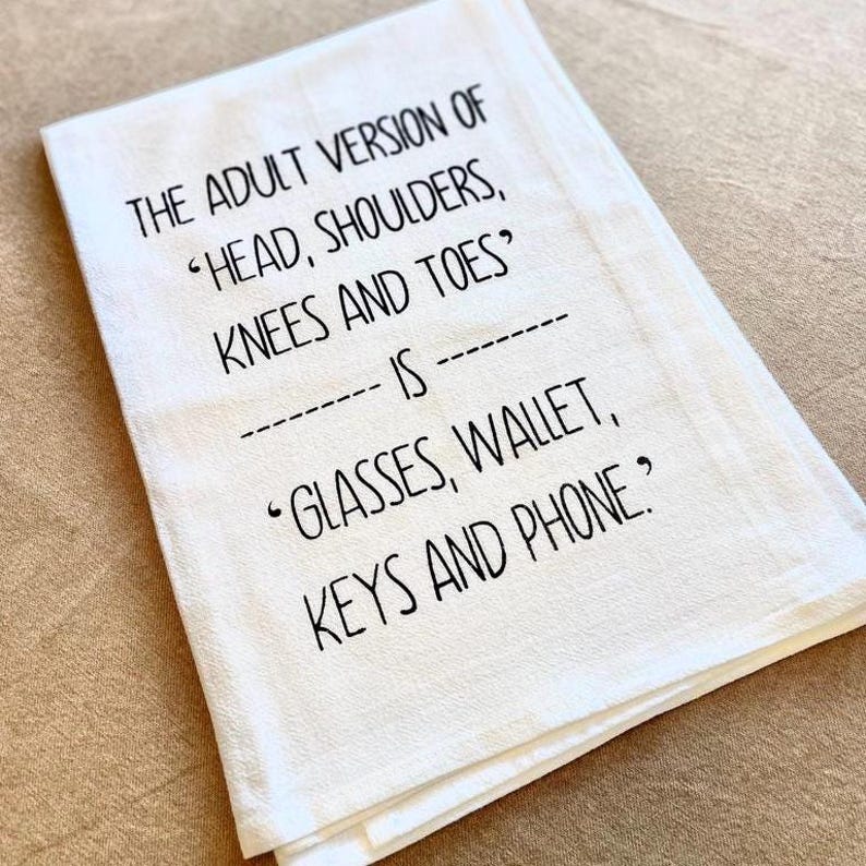 Adult Humor Gift Birthday Present Friend Funny Kitchen Towel Cotton Dish Cloth White Textile Absorbent Material Printed Joke Text Housewarming Hostess Appreciation Novelty Gag Item Sarcastic Comedy Design Perfect Kitchen Essential Unique The Adult Version Of Head, Shoulders, Knees and Toes is Glasses, Wallet, Keys and Phone Kitchen Tea Towel Screen Printed