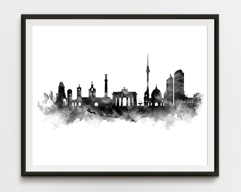 May include: Black and white watercolor painting of the Berlin skyline. The skyline includes the Brandenburg Gate, the Berlin TV Tower, and other iconic buildings.