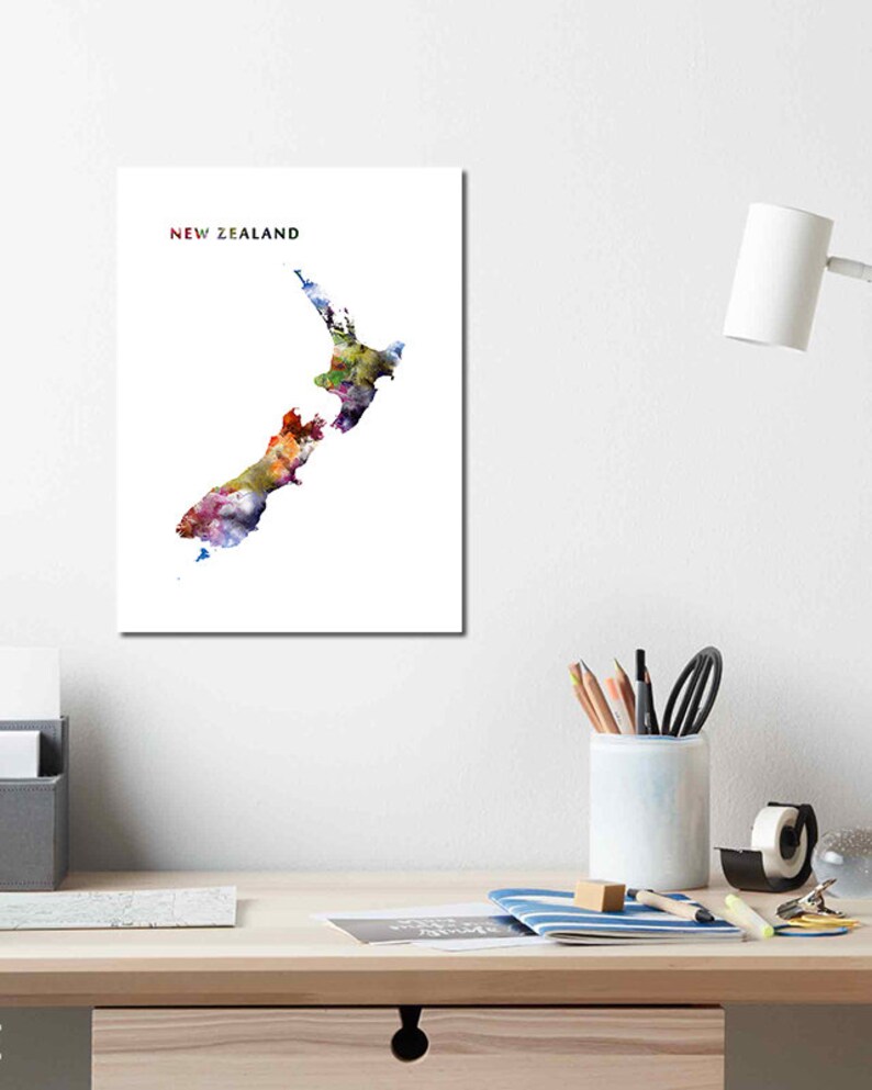 May include: A watercolor painting of New Zealand, with the country's name printed in red and black at the top of the image.