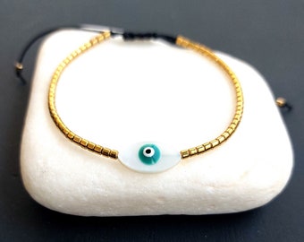 Gold evil eye bracelet, Mother of pearl evil eye bracelet, Gold hematite bracelet with shell evil eye, Minimalist evil eye hematite bracelet