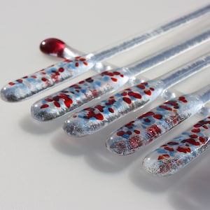 Set of six red , white and blue fused glass swizzle sticks