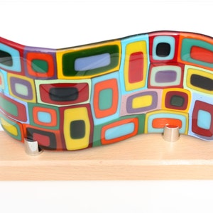 Spangles fused glass wave, a colourful glass panel artwork for suncatcher or window display