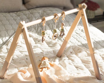 Baby gym made of natural wood, activity center, Well made, sturdy frame, cacao color, hangers for babygym