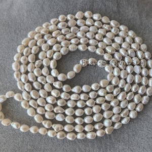 Lange witte barokke parelketting: 7-8 mm gekweekte rijstparels