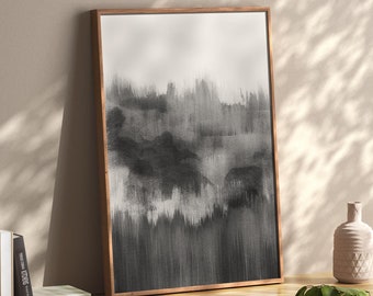 May include: A black and white abstract art print in a wooden frame. The print features a series of vertical lines that create a sense of depth and movement. The print is displayed on a wooden shelf with books and a decorative figurine.