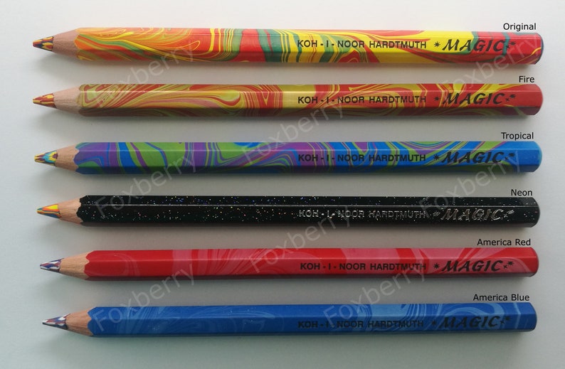 May include: Six different colored pencils with the brand name "KOH-I-NOOR HARDTMUTH MAGIC" printed on each. The pencils are arranged vertically from top to bottom: original, fire, tropical, neon, America red, and America blue.