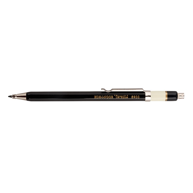 May include: A black mechanical pencil with a silver clip and a white eraser. The pencil is labeled "KOH-I-NOOR Versatil 5900".